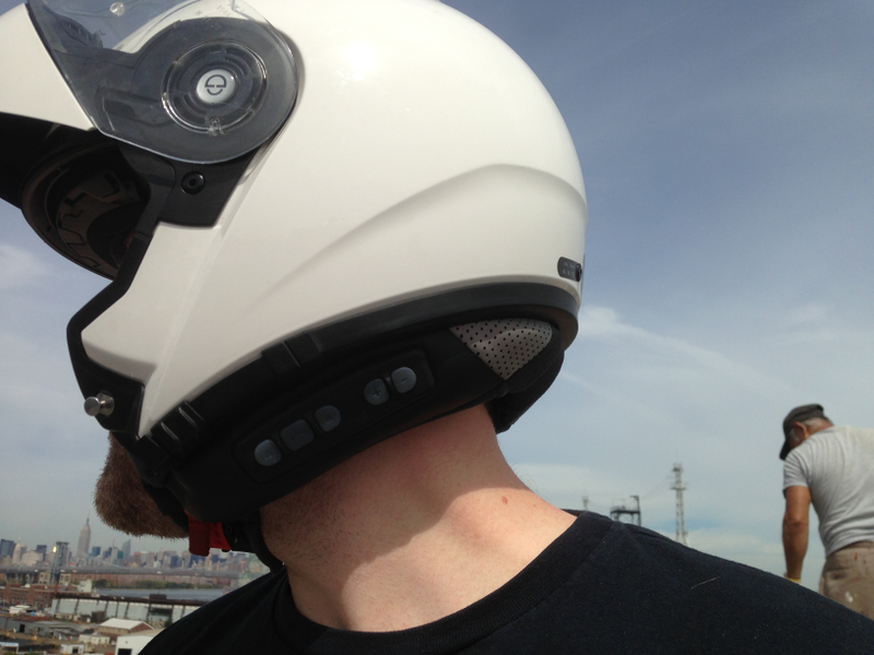 Illustration for article titled What's Better? A $1,200 Motorcycle Helmet or Cheap Earbuds?